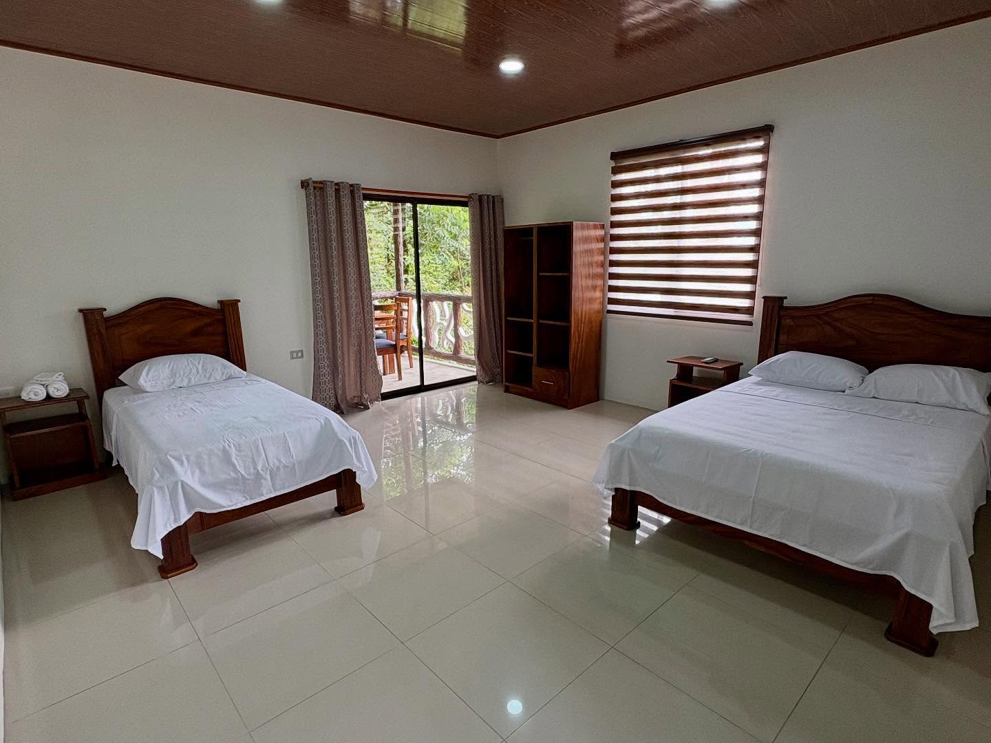 Triple room interior with jungle view